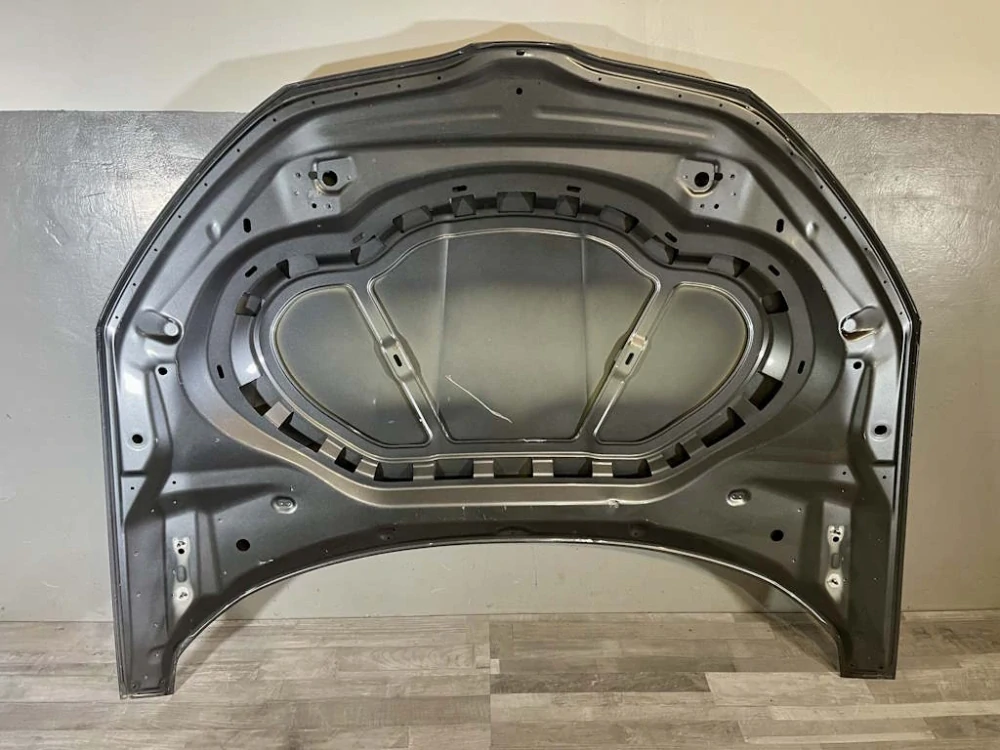 ŠKODA OCTAVIA 4 2019-2023 - 5E3 - kapota - POŠKOZENÁ