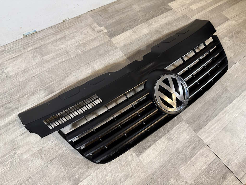 VW TRANSPORTER T5 - 7H - 2003-2009 - maska se znakem - 7H0807101/5