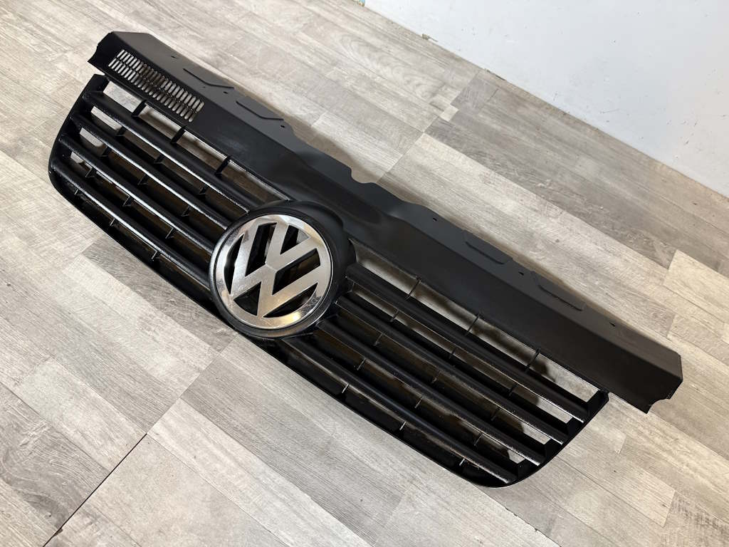 VW TRANSPORTER T5 - 7H - 2003-2009 - maska se znakem - 7H0807101/5