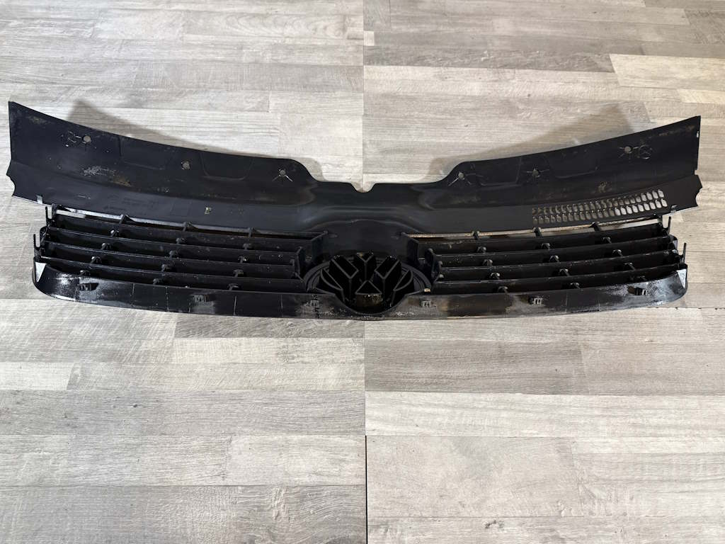 VW TRANSPORTER T5 - 7H - 2003-2009 - maska se znakem - 7H0807101/5